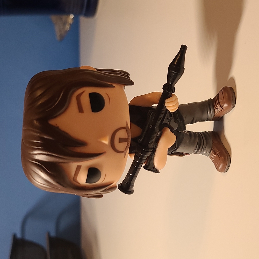 Daryl Dixon vinyl figure. 3 1/2 H, 2 3/4" W.